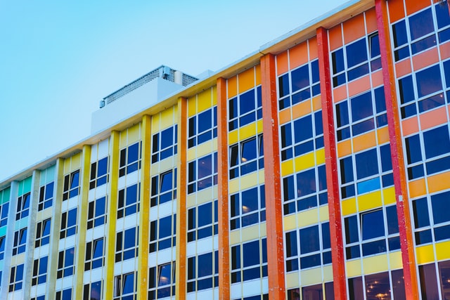 Multicolor Stucco Paint Ideas 6 image of orange and yellow stucco on the facade of houses
