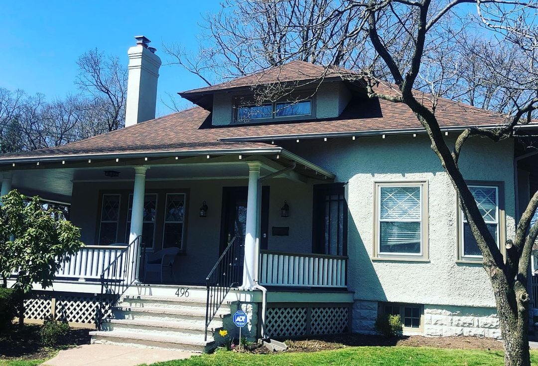 Premium Stucco Restoration & Painting in Glen Rock NJ Historic Glen Rock NJ Craftsman home with restored pebble stucco, fresh trim paint, porch and chimney
